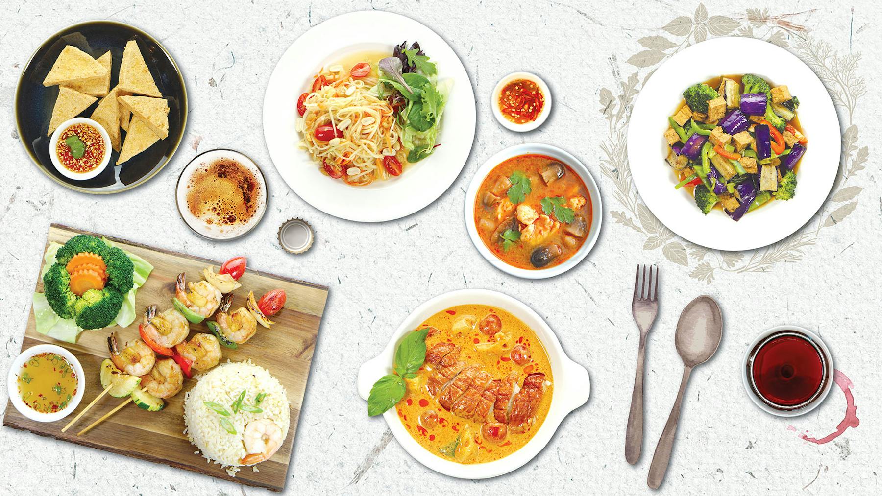 a bunch of different types of food on a table